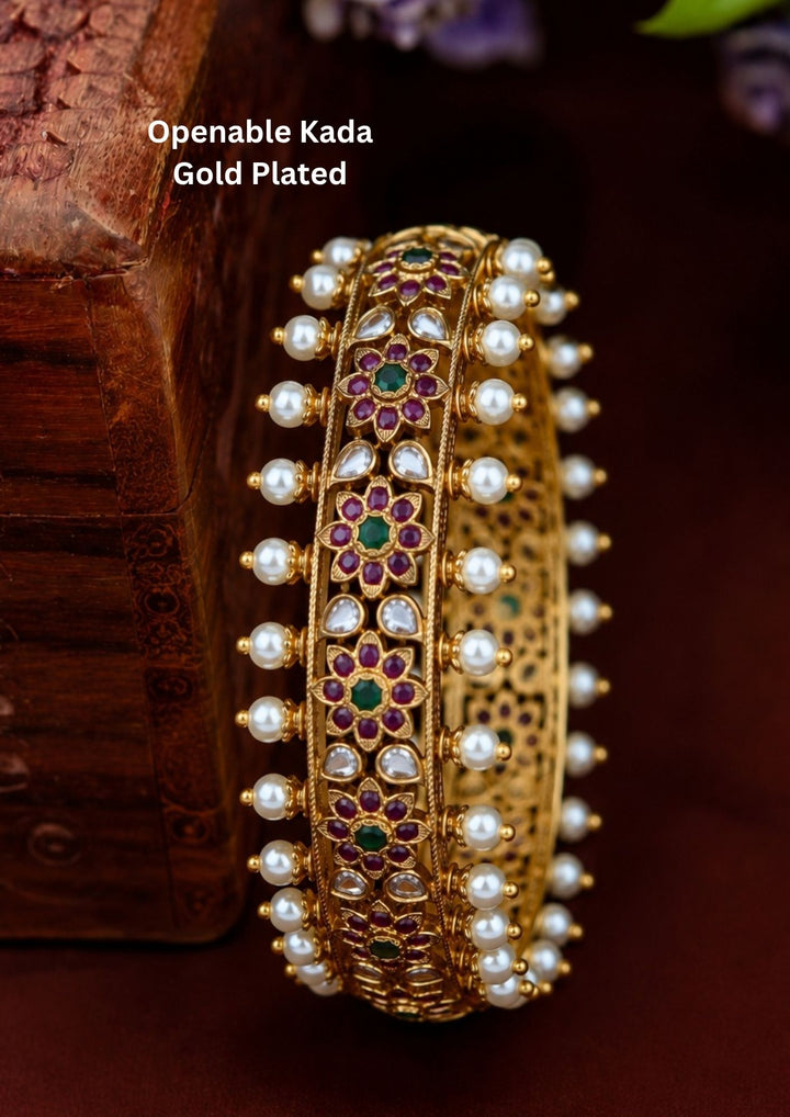 Beautiful Jadau Kundan gold plated openable kada adorned with pearls, floral motifs, and premium craftsmanship. Perfect for weddings, festive occasions, traditional wear, and gifting.