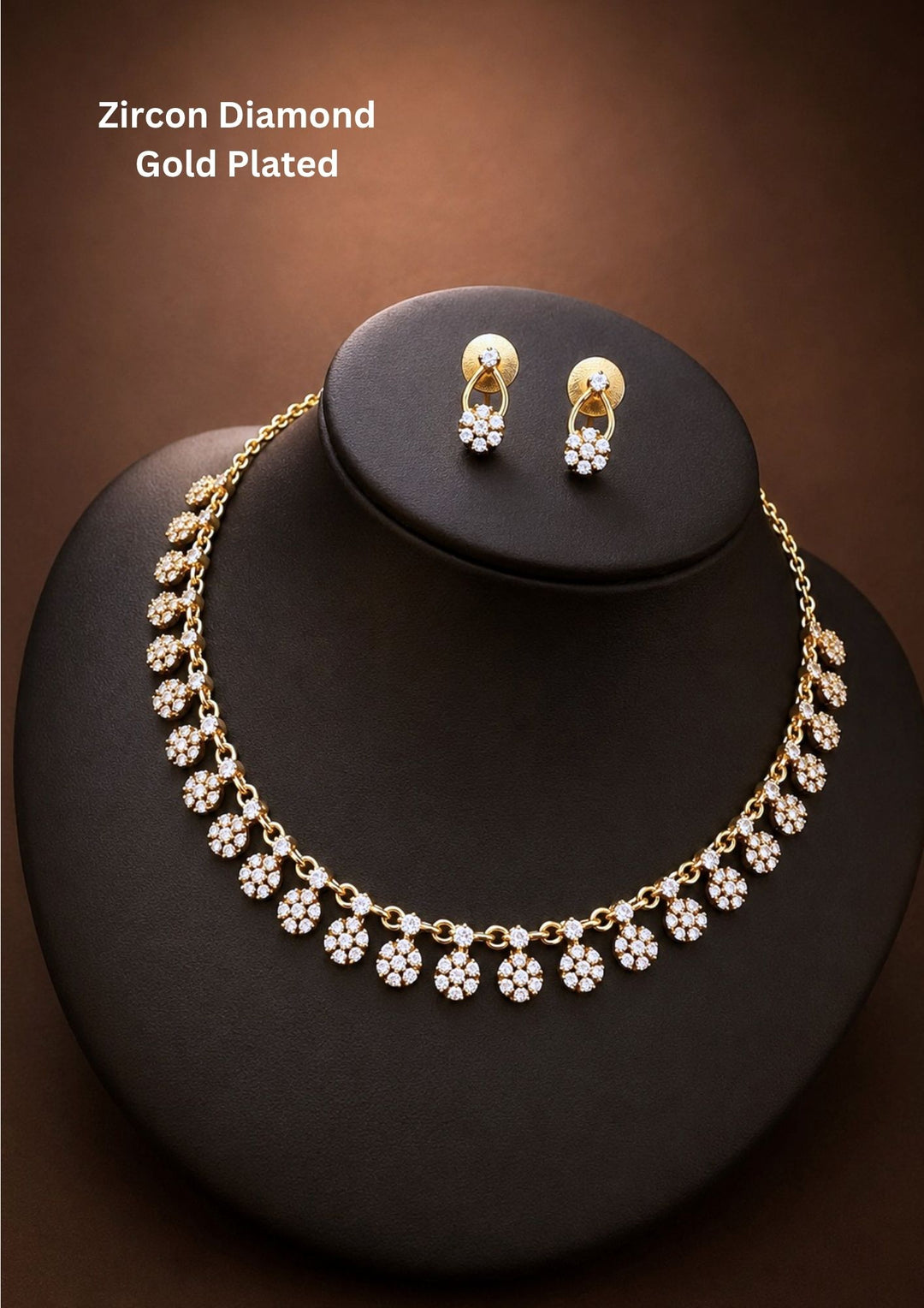 gold plated jewelry set featuring a delicate link chain adorned with a row of dangling circular floral clusters studded with sparkling white pure zirconian diamonds. The matching hanging earrings feature a minimalist gold loop design suspending a single diamond flower cluster. Perfect for weddings, parties, office wear, and festive celebrations with skin-friendly quality, comfortable fitting, and Cash on Delivery available now.