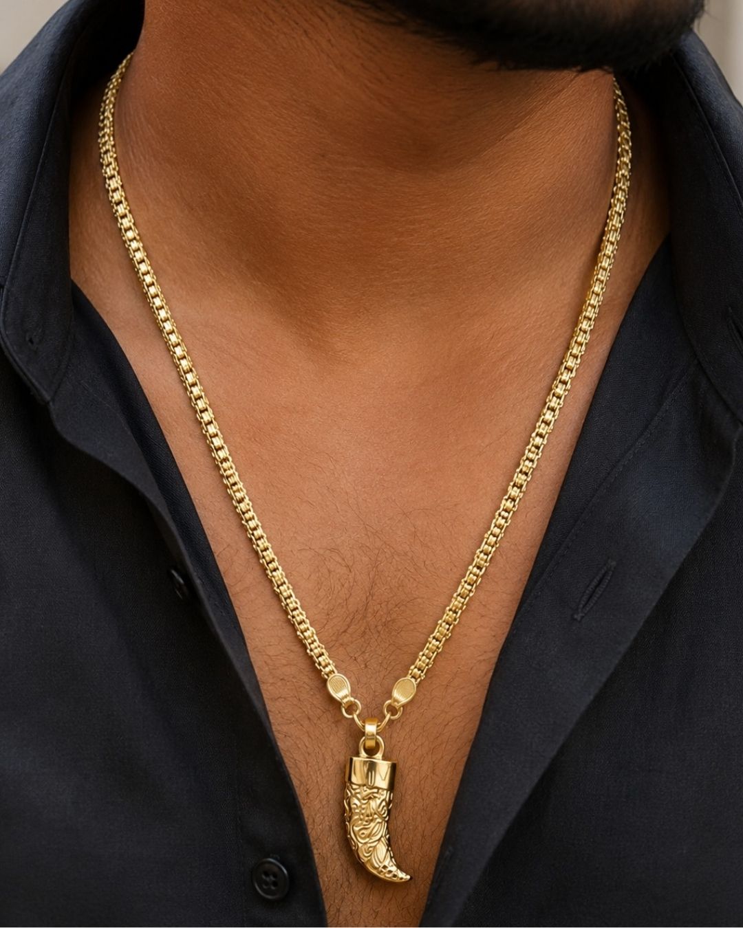 Beautiful gold plated necklace featuring an elegant fine-link chain and a detailed horn-shaped pendant with intricate traditional engraving. Perfect for everyday wear, weddings, festive occasions, traditional outfits, parties, and gifting.