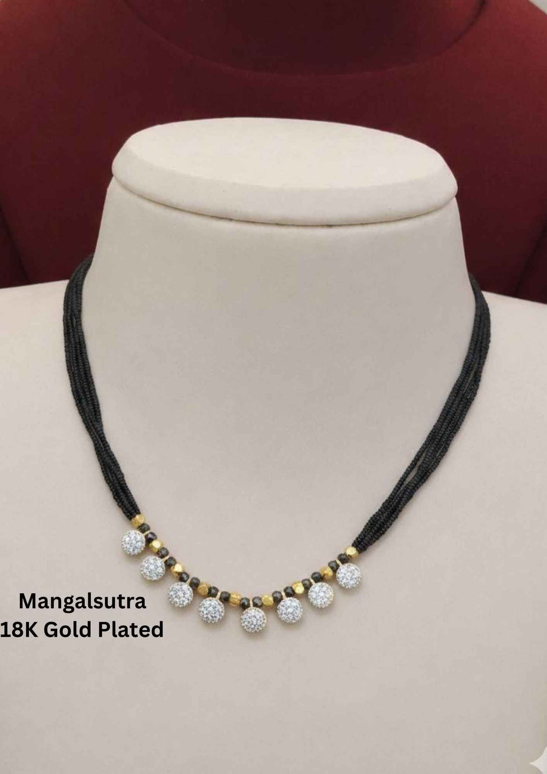 Black beads necklace with gold and silver beads