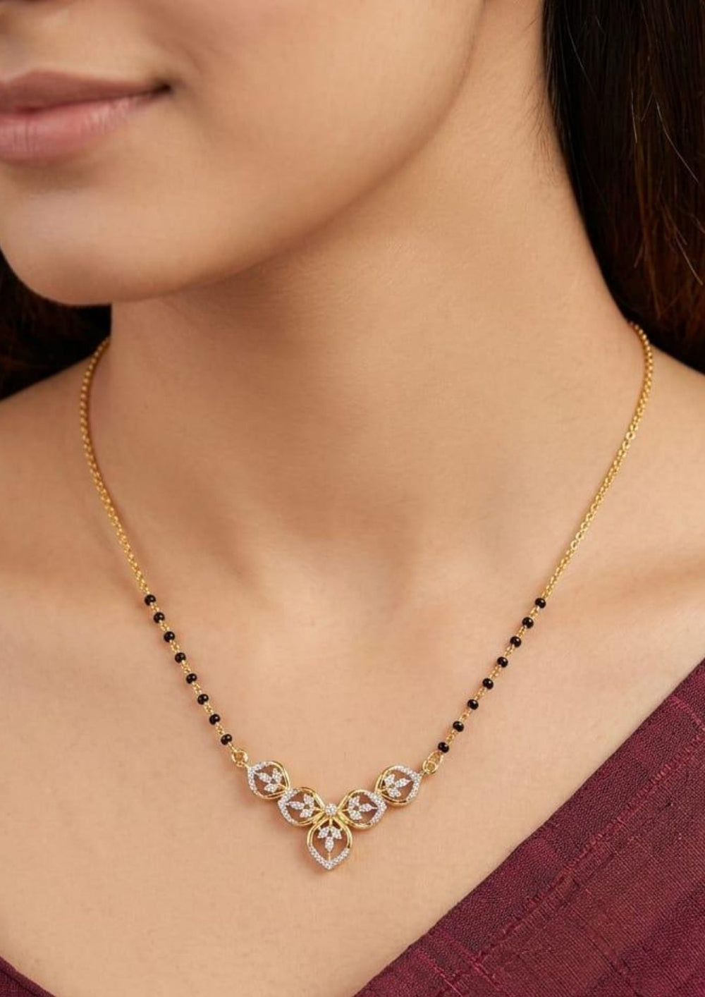 Pure Zirconian Diamond Gold Plated Floral Finish Mangalsutra  women is saree wearing it it is skin friendly  ideal for daily wear