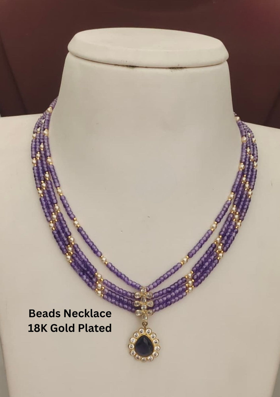Purple beaded necklace with gold Plating