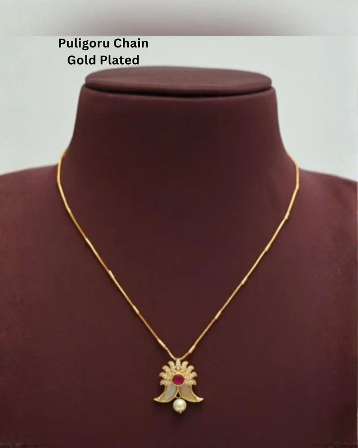 gold plated puligoru chain comes with pearl drop and rudy stone in pendent and show picture clearly how it looks and anti faded and skin safe and can be used for weeding&