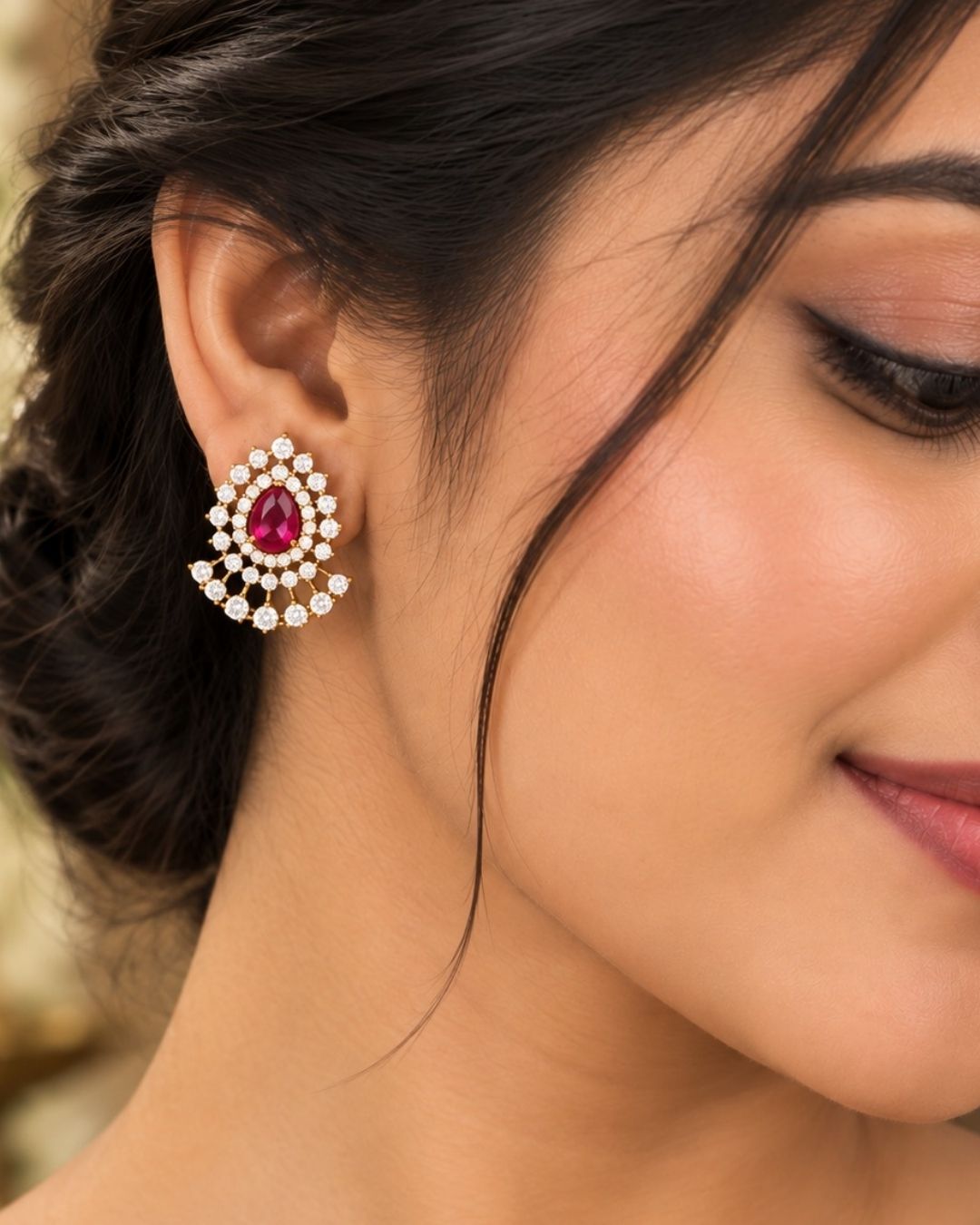 South indian women wearing a pure Zircon diamond gold plated pink ruby teardrop pendant set showing a flat golden chain and matching studs that give a graceful traditional and modern look for daily wear and office gifting with COD.