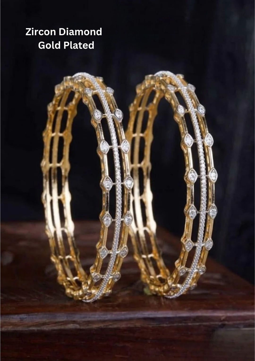 gold plated open-work grid kada bangles. The architectural design features two parallel outer rows of gold connected by delicate vertical bars, highlighted down the center by a solid track of micro-pave pure Zirconian diamonds and accented with diamond-shaped crystal frames along the edges.