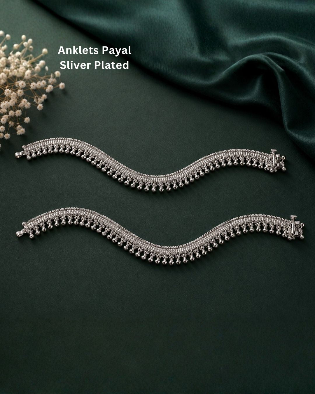 Beautiful silver plated designer payal set featuring intricate layered chain detailing and numerous delicate hanging silver beads. Perfect for traditional occasions, festive wear, daily wear, and gifting.