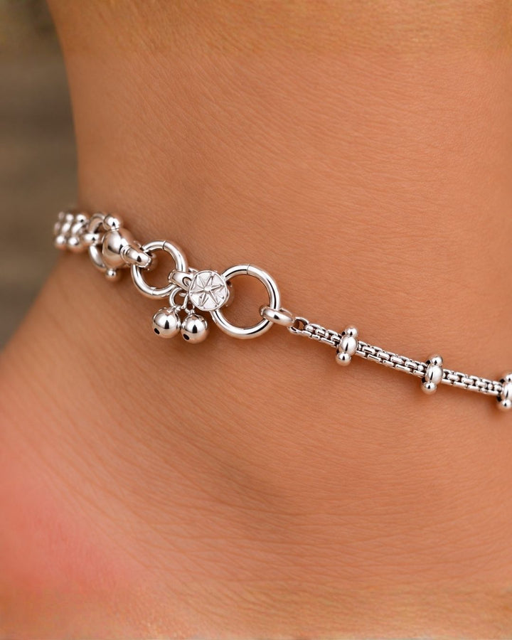Beautiful silver plated chain anklet set featuring delicate textured chains, polished silver beads, and decorative hanging charms. Perfect for traditional occasions, festive wear, daily wear, and gifting.