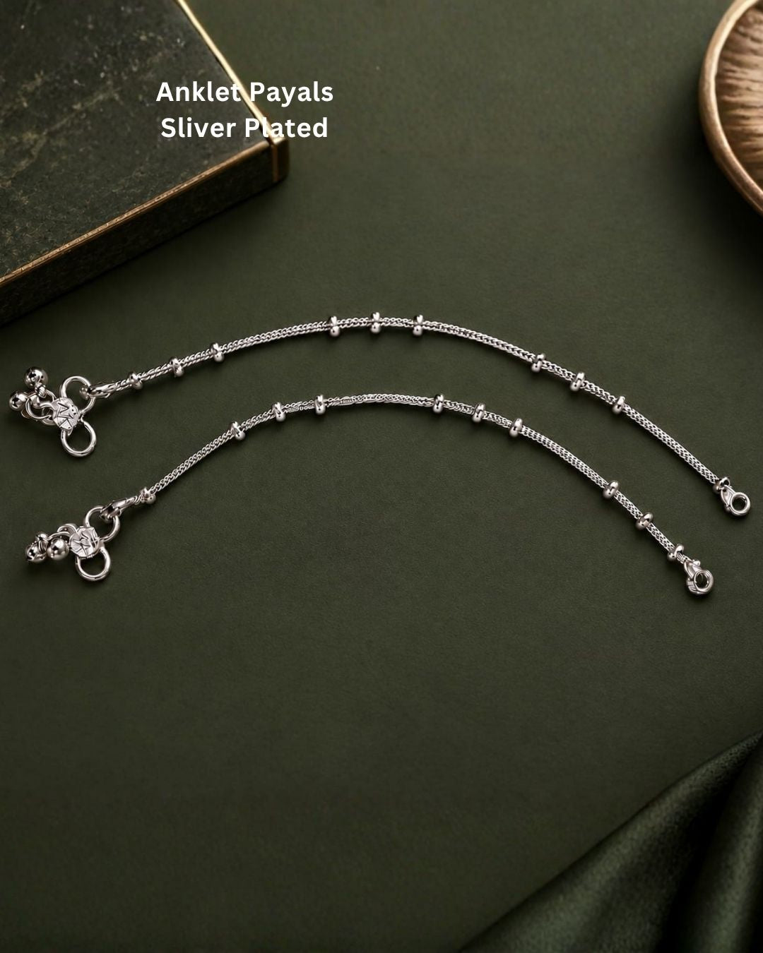 Beautiful silver plated chain anklet set featuring delicate textured chains, polished silver beads, and decorative hanging charms. Perfect for traditional occasions, festive wear, daily wear, and gifting.