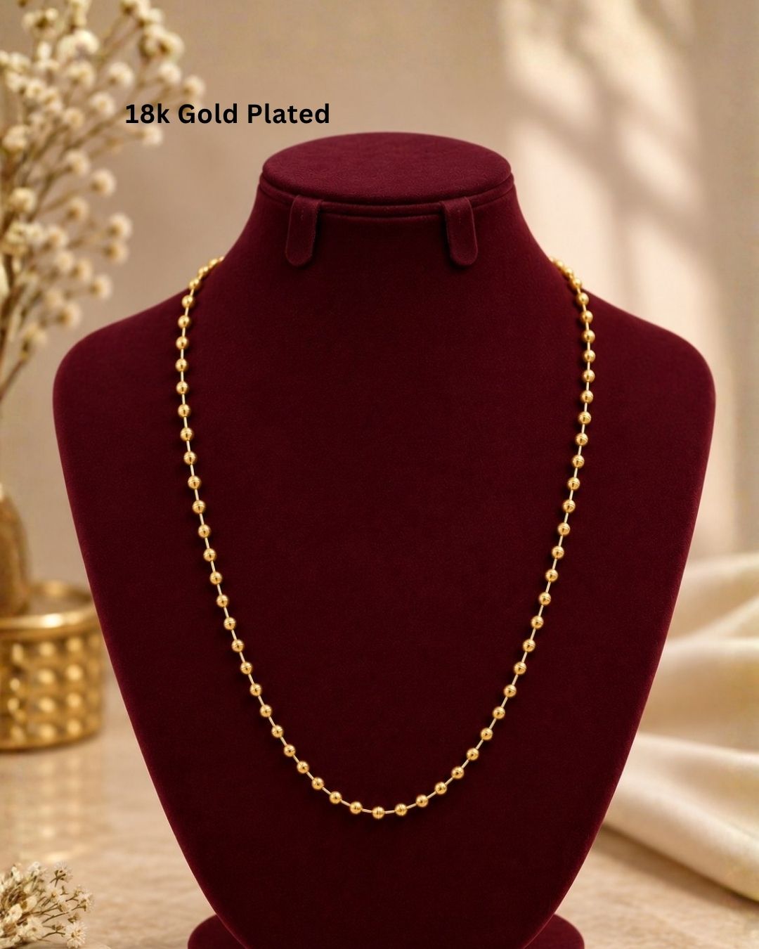  gold plated beaded chain featuring textured round beads and a polished finish. Perfect for daily wear, festive occasions, layering, traditional outfits, and premium gifting.