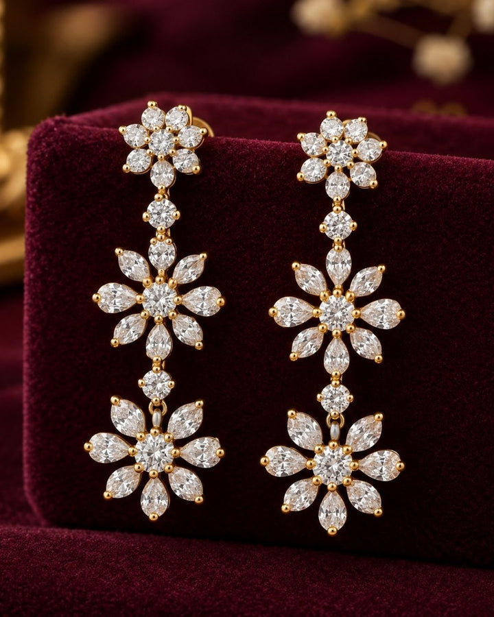 South Indian Woman wearing a Gold-plated zircon diamond necklace and earrings designed with floral pattern and tear drop in between the florals perfect for weddings, parties, functions.