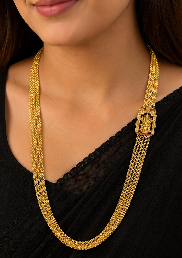 South Indian women wearing Traditional Lakshmi Chandraharam necklace designed with multiple fine gold plated chains and an intricate Goddess Lakshmi centerpiece. A timeless South Indian jewellery piece that complements silk sarees, bridal attire, and festive ethnic wear.