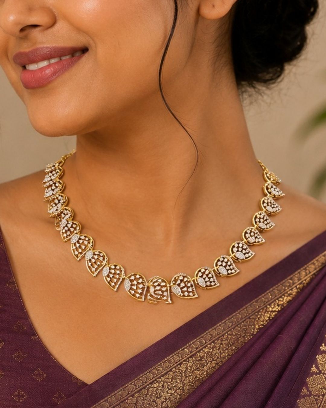 Gold plated jewelry set  featuring a delicate choker necklace made of repeating, stylized leaf or paisley-shaped links. Each openwork link is encrusted with brilliant, clear white Zirconian diamonds (American Diamonds) that catch the light beautifully. Includes a matching pair of elegant hanging earrings mimicking the exact leaf pattern. Crafted for festive occasions and parties with premium quality and Cash on Delivery available.