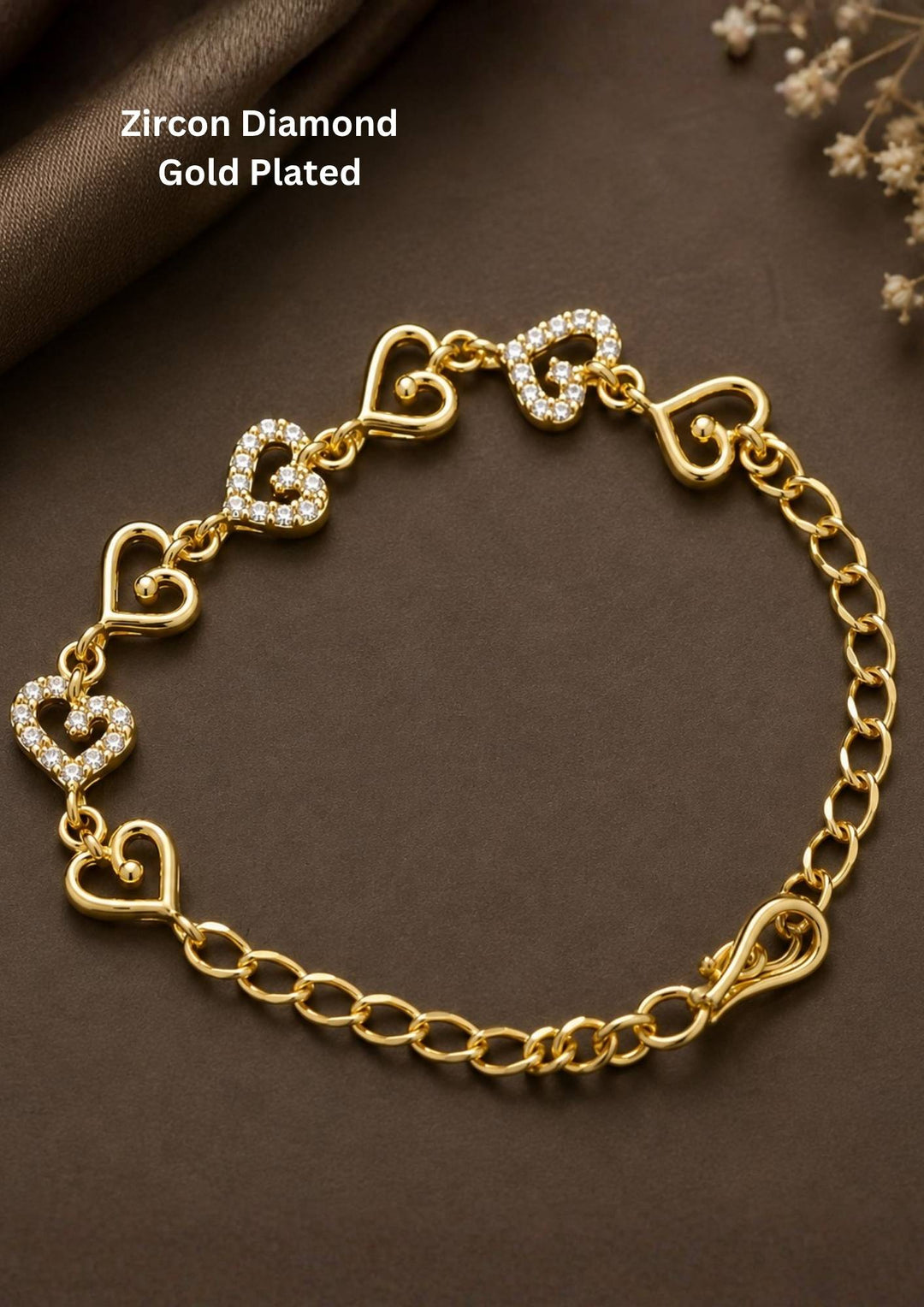 Premium 18K gold plated heart charm bracelet with sparkling zircon accents and a delicate adjustable chain, ideal for gifting and daily wear.