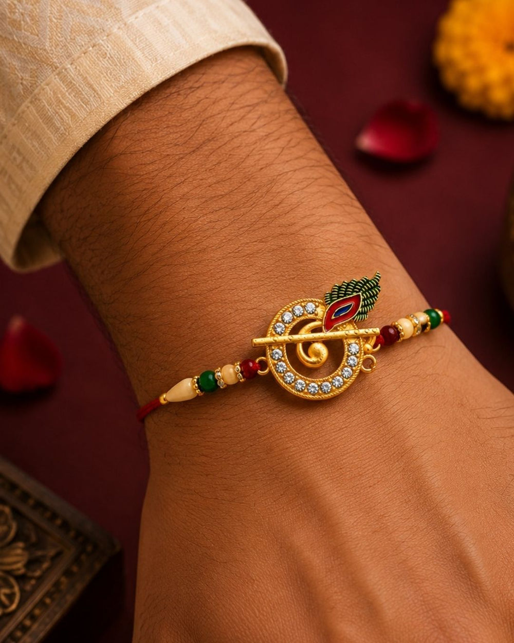 Beautiful Krishna Flute Rakhi designed with a golden bansuri, peacock feather charm, shimmering stones, and vibrant beads. Perfect for Raksha Bandhan celebrations, traditional gifting, festive wear, and expressing love and blessings for your brother.