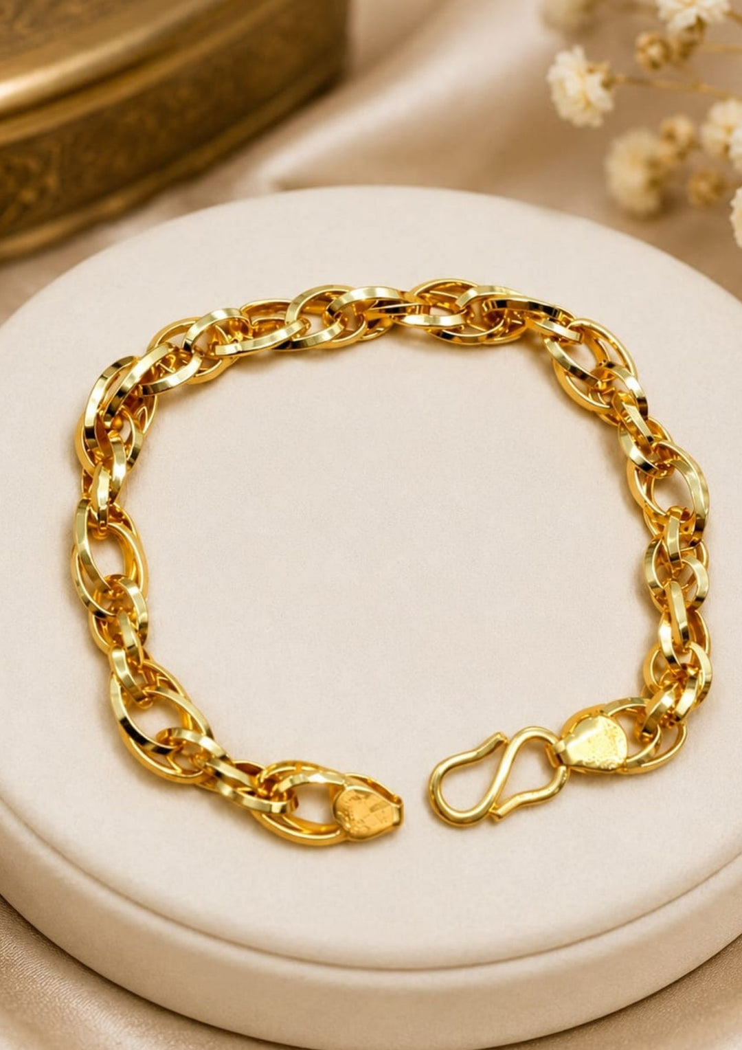 Premium gold plated bracelet for men showcasing smooth oval chain links and a sleek finish, ideal for casual, festive, and party wear.