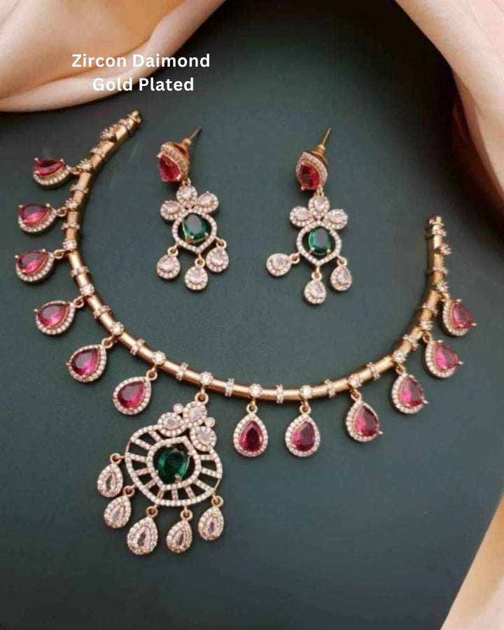 Gold-plated necklace and earrings with gemstones