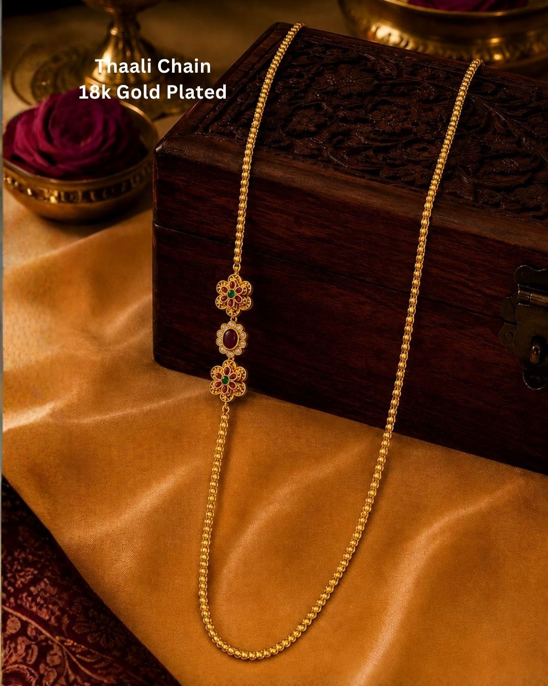 Beautiful floral gold plated long chain featuring intricate temple-inspired craftsmanship, ruby-colored stone accents, and a lightweight beaded design. Perfect for weddings, festive occasions, traditional outfits, temple visits, and premium gifting.