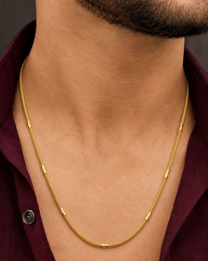 Beautiful mesh-style gold plated chain featuring intricate woven detailing and elegant cylindrical accents. Perfect for daily wear, festive occasions, traditional outfits, and premium gifting.