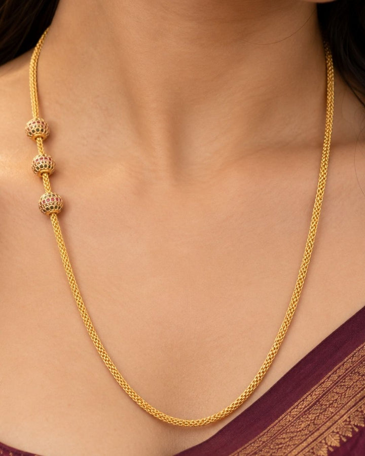 18K Gold Plated Thaali Chain with beautiful rope design and with gold beads on the sides, shiny gold finish, lightweight and comfortable to wear all day, sweat proof, anti-fade colour, skin-friendly quality, and perfect for daily wear, pooja functions, festivals, weddings and traditional occasions.