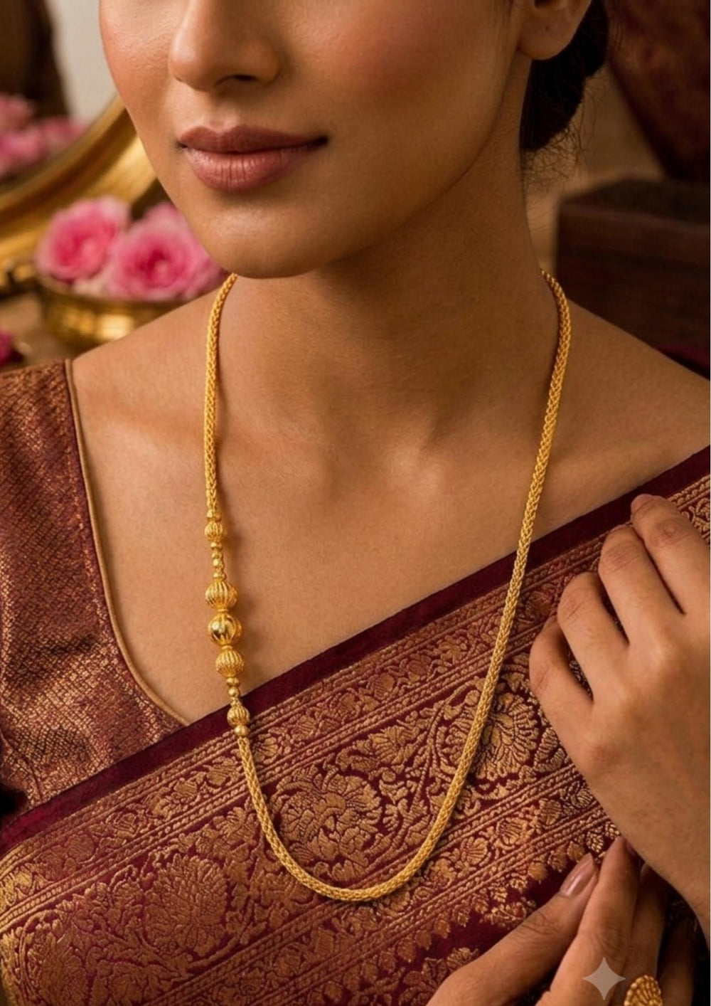 South indian women's Classic gold plated long chain with ornamental bead accents, lightweight and ideal for everyday elegance or traditional occasions.