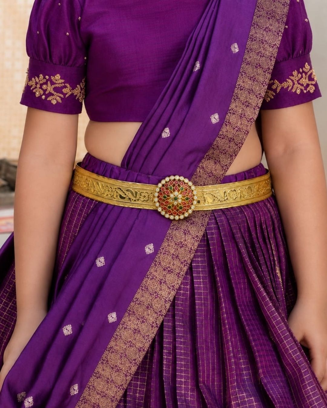 Beautiful gold plated designer hip belt featuring pink, green, and white stone accents with a removable floral pendant. Suitable for kids and adults, perfect for traditional outfits, festive occasions, dance performances, weddings, and special events.