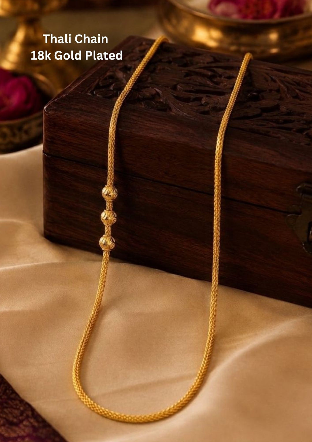 Elegant 18K gold plated Thali chain featuring a sleek and lightweight chain design accented with three polished gold beads placed gracefully on the left side. The simple yet stylish pattern offers a traditional South Indian look, making it ideal for daily wear, office wear, casual outings, poojas and festive occasions.