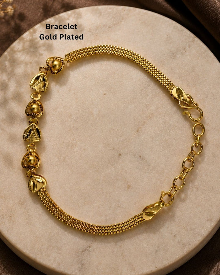 Stylish gold plated peacock design bracelet featuring intricate traditional motifs, vibrant green and ruby stone accents, sparkling white detailing, and an elegant linked pattern. Perfect for festive occasions, traditional outfits, weddings, parties, and special events.