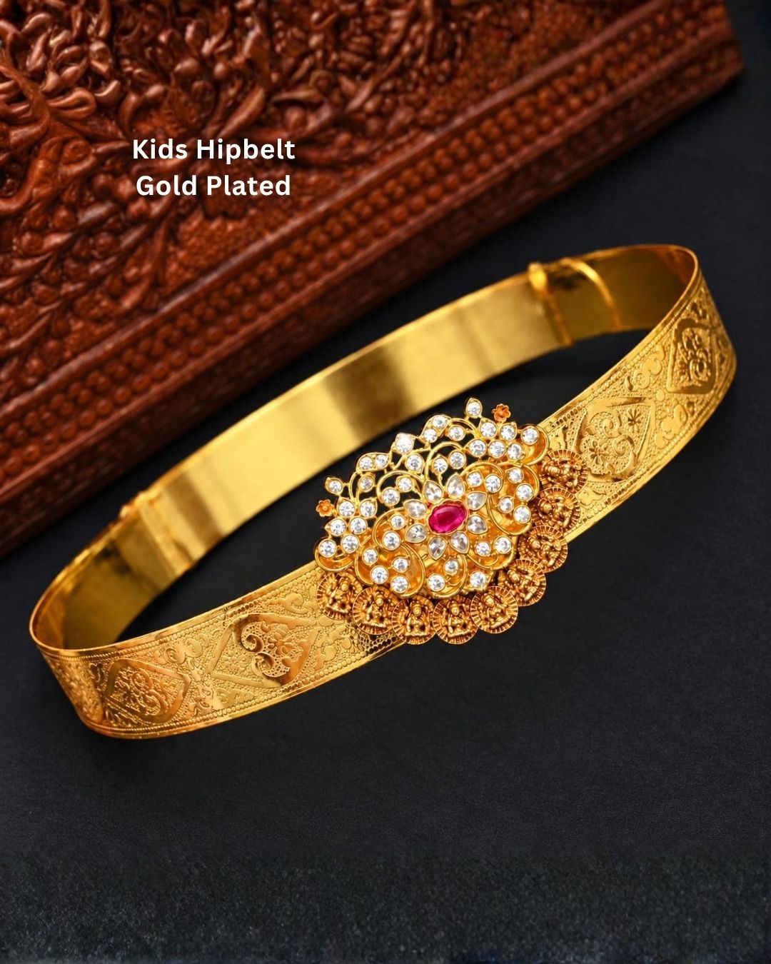 Elegant gold plated vaddanam with a floral crystal centerpiece and intricate detailing for festive and traditional wear.