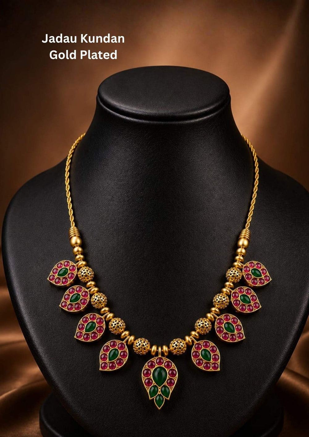 Beautiful Jadau Kundan gold plated necklace featuring pear-shaped kundan motifs, detailed gold beadwork, and elegant craftsmanship. Perfect for weddings, festivals, temple visits, traditional outfits, family functions, and premium gifting.