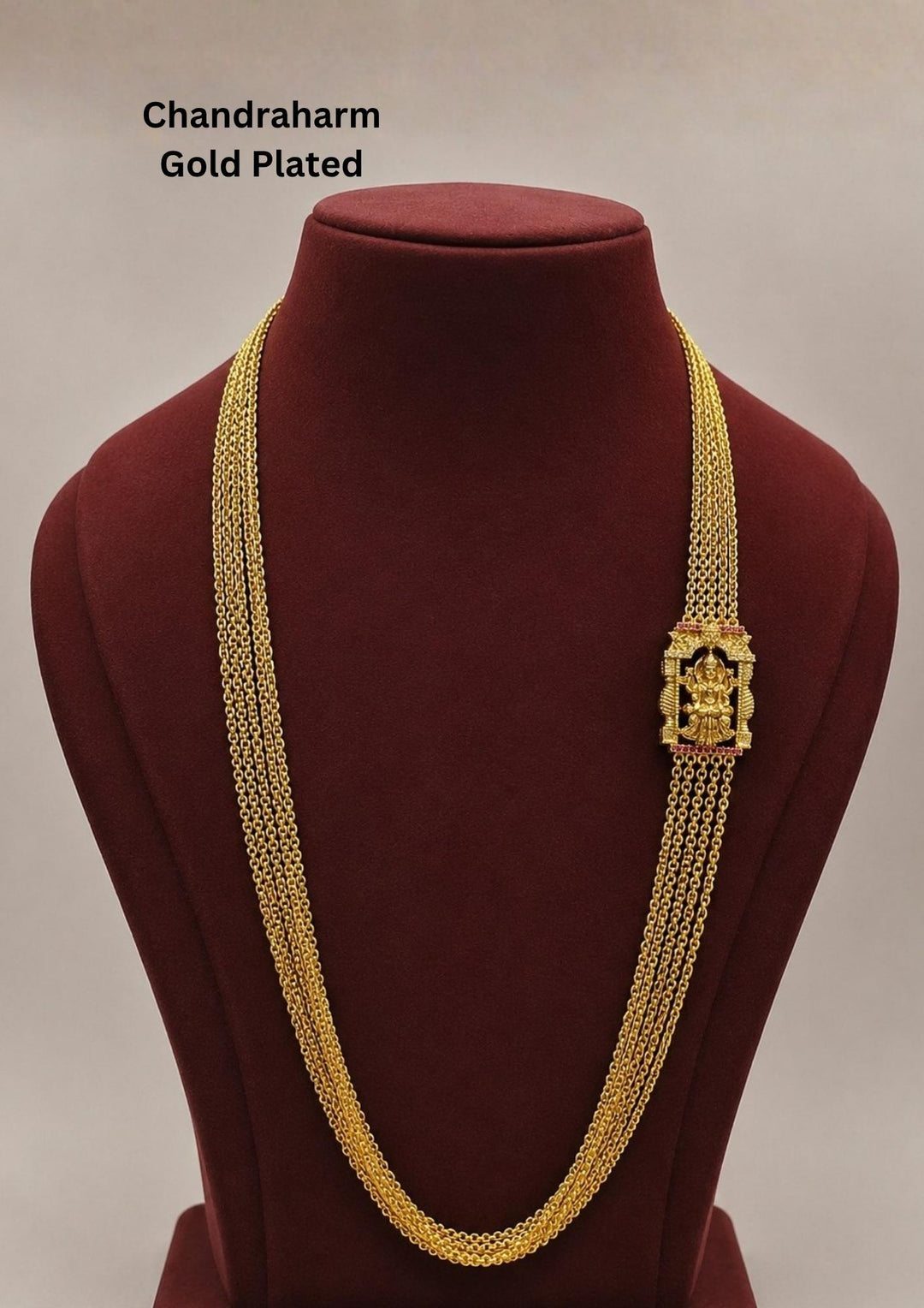 Elegant gold plated Chandraharam featuring multiple layered chains with a beautifully crafted Lakshmi temple motif centerpiece. Inspired by traditional South Indian temple jewellery, this long haram is perfect for weddings, festive celebrations, and bridal occasions.