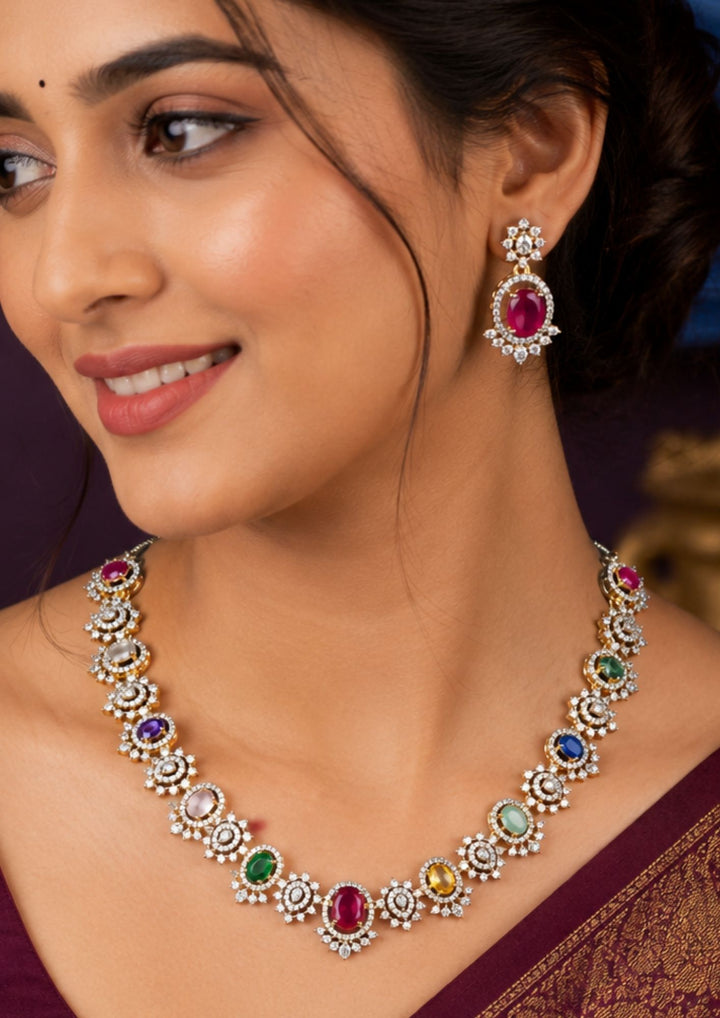 South Indian Woman wearing a Traditional Navaratna gold plated jewellery set crafted with colorful precious-inspired stones and brilliant zircon detailing. Designed to complement bridal outfits, silk sarees, festive attire, and elegant traditional styling.