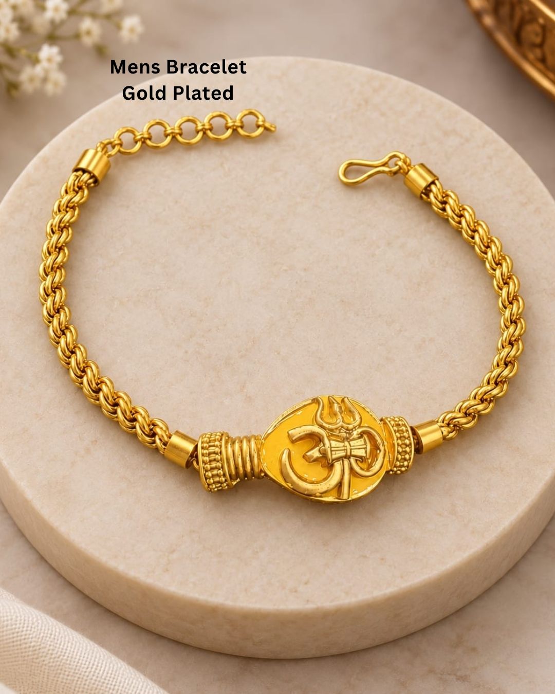 Elegant gold plated men’s bracelet featuring a beautifully detailed Om pendant, braided chain pattern, and polished gold finish, perfect for daily wear, festive occasions, and traditional styling.