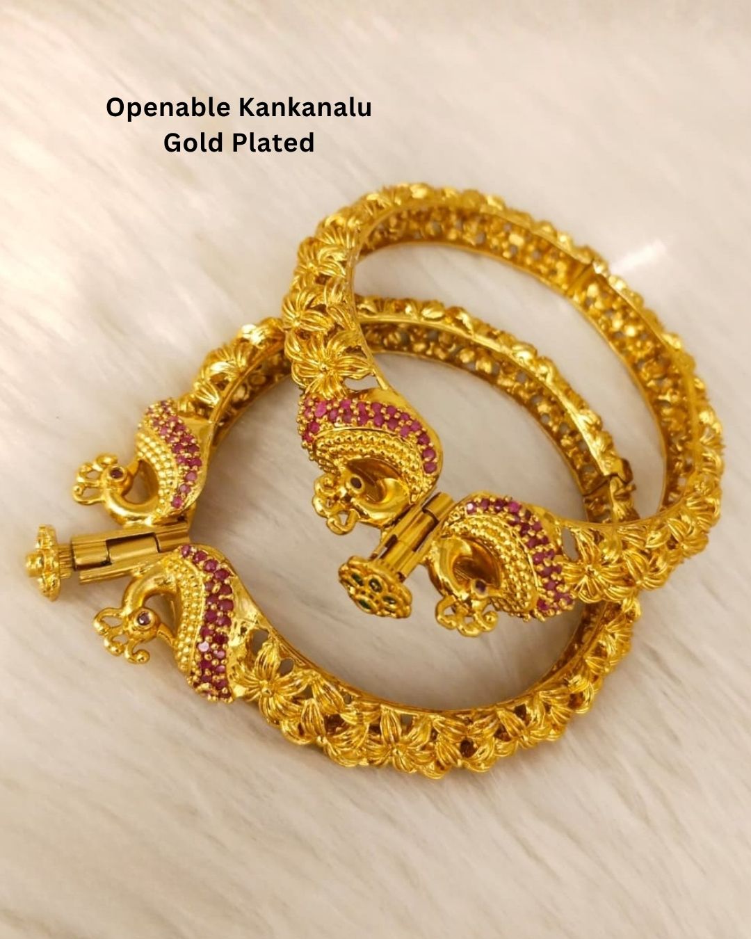 Designer Openable Peacock Gold Plated Kankanalu with floral engraved detailing, ruby-inspired embellishments, intricate craftsmanship, and an elegant hinged design.