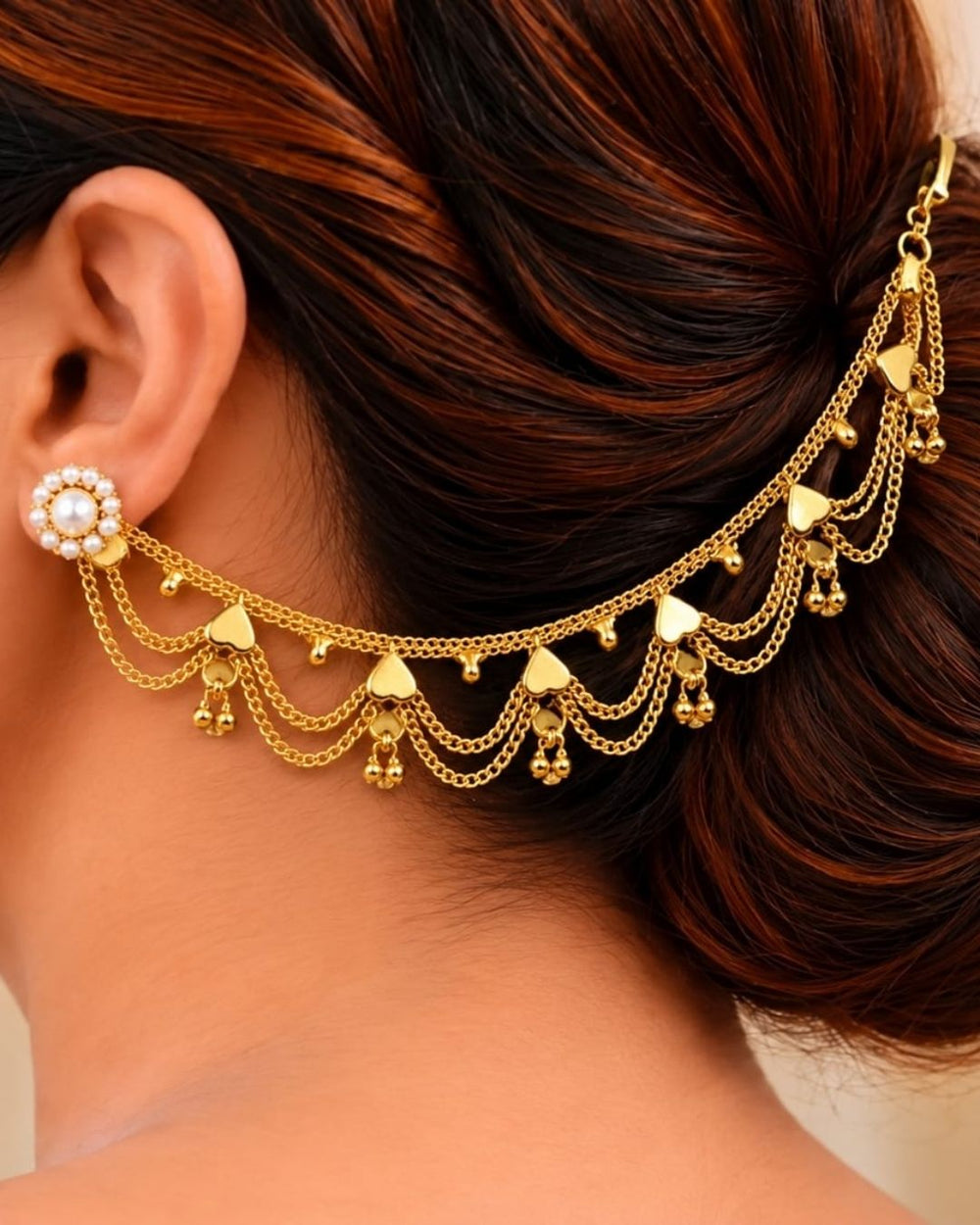 Gold plated traditional ear chains featuring multiple layered chain loops, decorative heart-shaped links, and tiny gold bead drops.