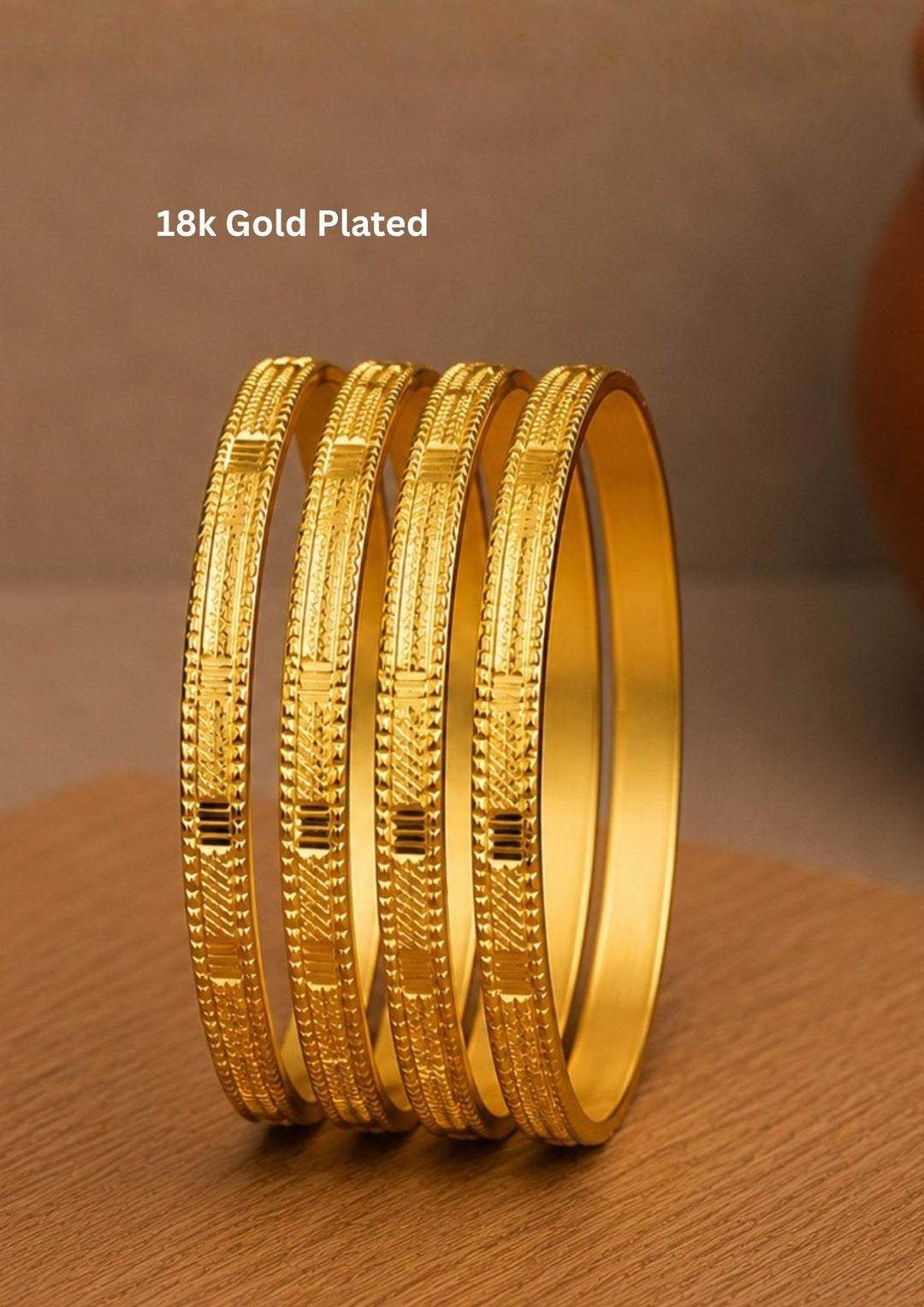 Classic 18K gold plated textured bangles featuring elegant engraved patterns with a timeless traditional finish for daily and festive wear.