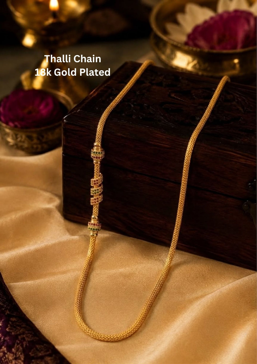 Elegant 18K gold plated South Indian thalli chain featuring a sleek woven design with decorative ruby and emerald bead accents for traditional wear.