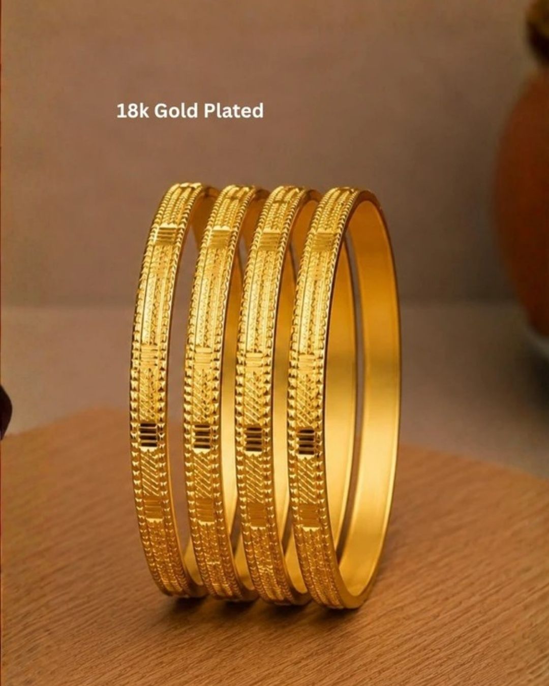 Classic 18K gold plated textured bangles featuring elegant engraved patterns with a timeless traditional finish for daily and festive wear.