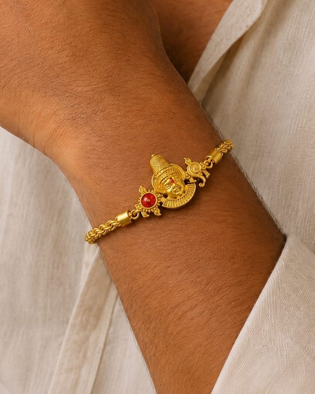Beautiful gold plated Balaji bracelet featuring a detailed Lord Balaji centerpiece with a red stone accent, paired with a twisted rope chain and adjustable extension links. Perfect for devotional wear, traditional occasions, festive celebrations, daily wear, and gifting.