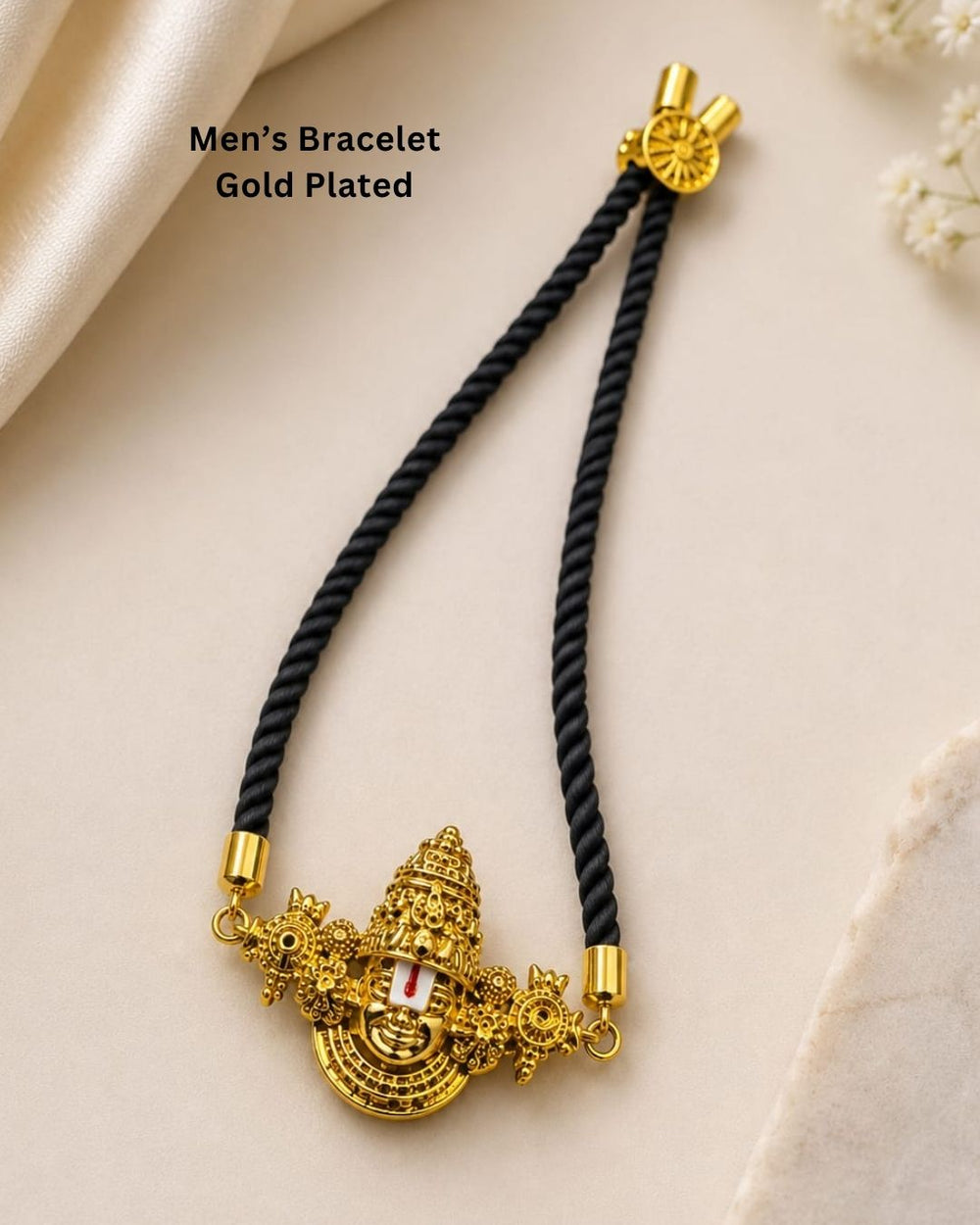 Stylish men's black thread bracelet featuring a detailed Lord Venkateswara gold plated centerpiece, designed for spiritual wear, traditional occasions, daily wear, and gifting.
