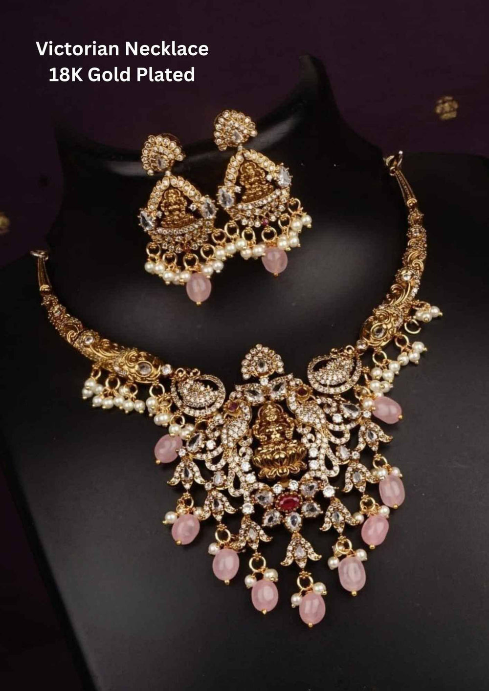 Victorian-style gold-plated necklace and earrings with pink stones