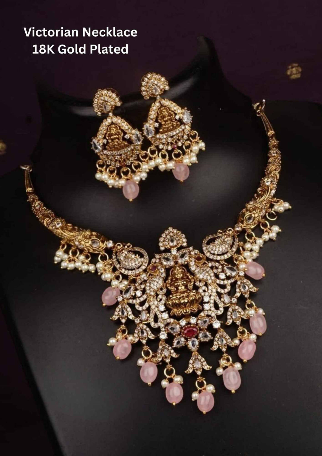 Victorian-style gold-plated necklace and earrings with pink stones