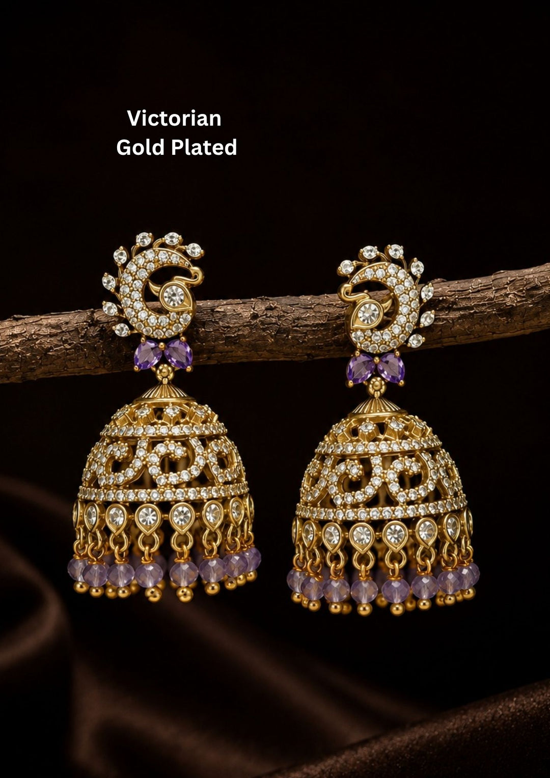 Gold-plated earrings with purple gemstones it is designed with victorian style perfect for birdal, weddings and it is anti fade color