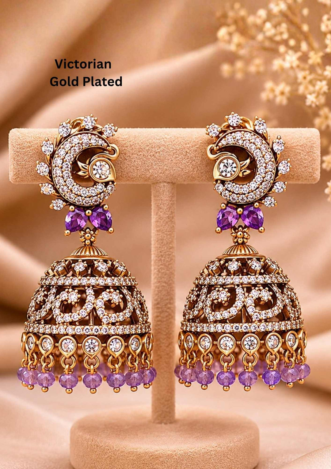 Gold-plated earrings with purple gemstones it is designed with victorian style perfect for birdal, weddings and it is anti fade color