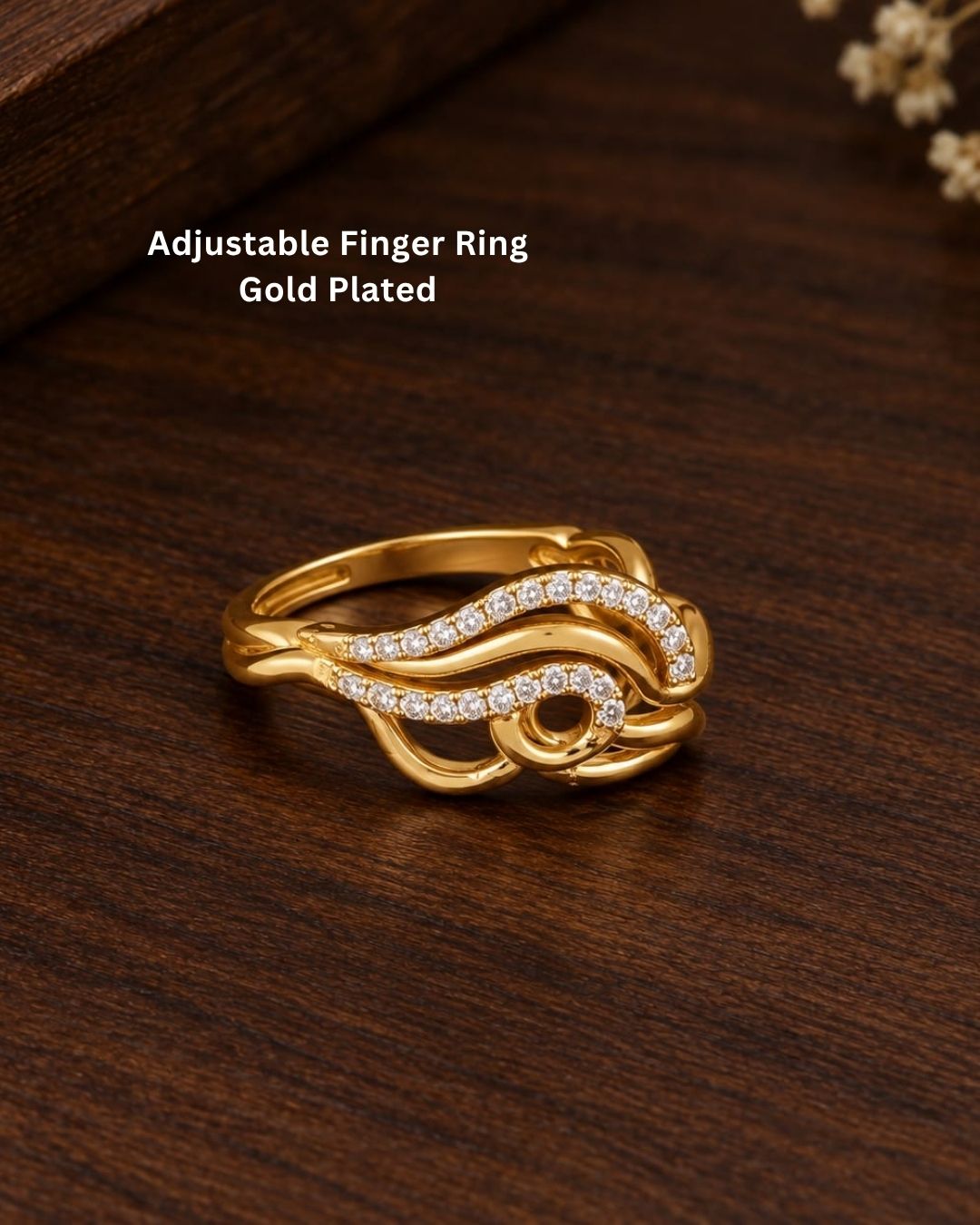 Elegant gold plated adjustable ring featuring a unique flowing wave design, sparkling stone accents, polished gold finish, and contemporary styling, perfect for daily wear, parties, festive occasions, and special looks.