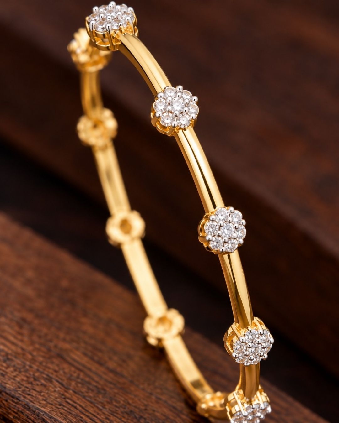 gold plated flower bangles come with zircon diamond and in picture shows clearly how it looks looks very classy and simple and ani faded and skin safe and can be used for daily ware, office ware and festivals