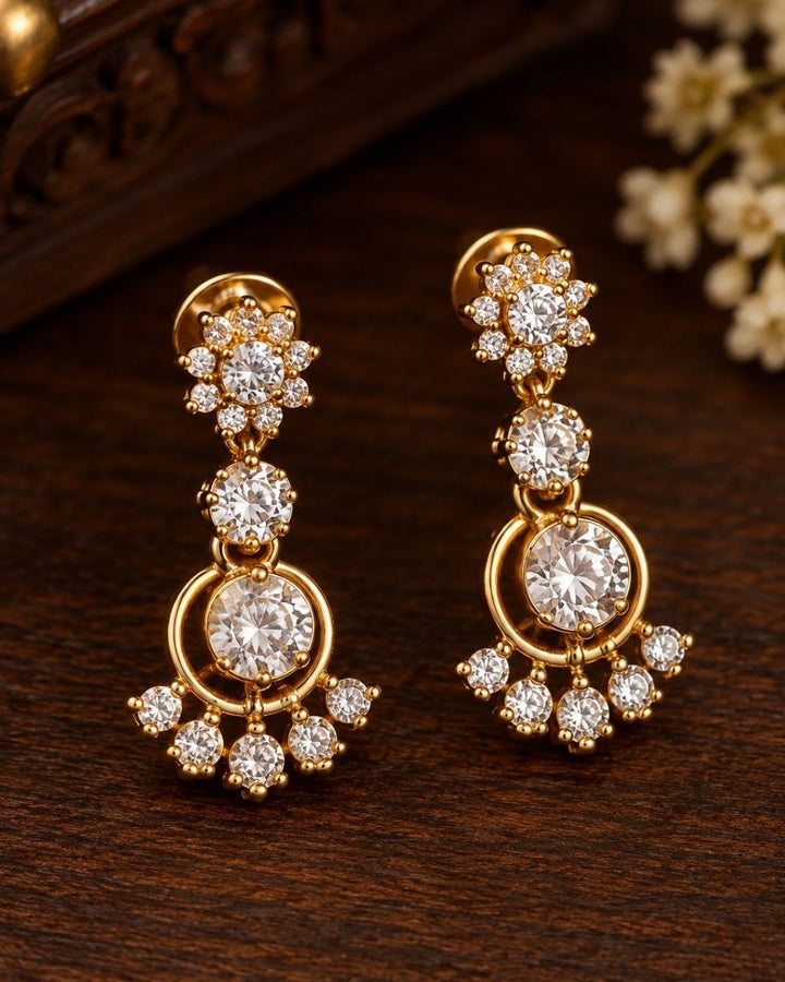Woman wearing a zircon diamond gold plated long haram necklace resting on dark wood alongside matching earrings that give a graceful traditional and modern look for formal receptions and wedding parties with COD.