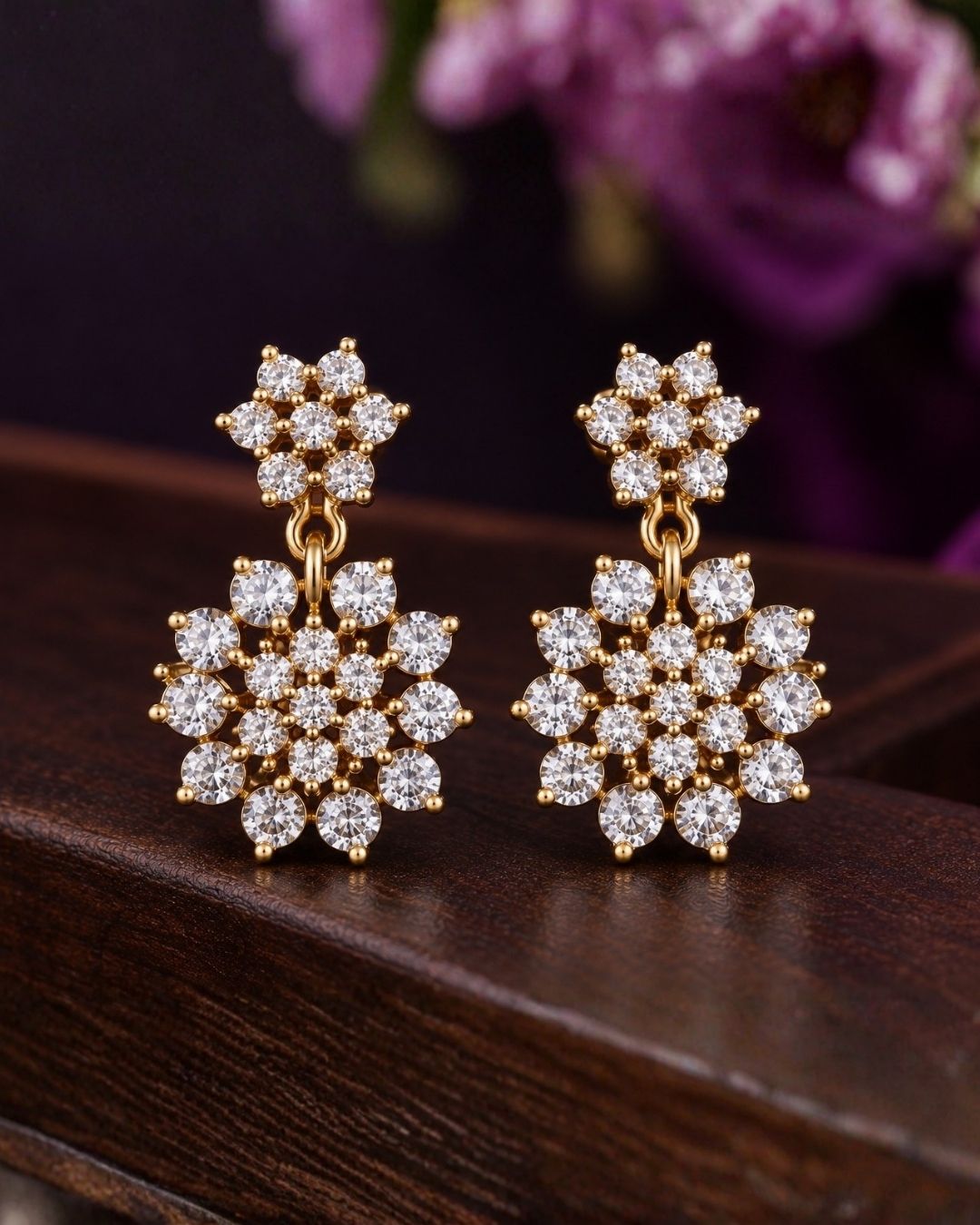 Zircon diamond gold-plated necklace set showcasing an intricate chain linked with tiny floral stone clusters and a beautiful geometric snowflake statement pendant. The matching earrings perfectly mirror the pendant&