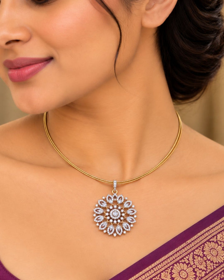 Premium gold plated necklace set featuring a large floral-inspired zircon pendant surrounded by sparkling stones, paired with matching floral stud earrings. Perfect for weddings, festive occasions, parties, traditional wear, and gifting.
