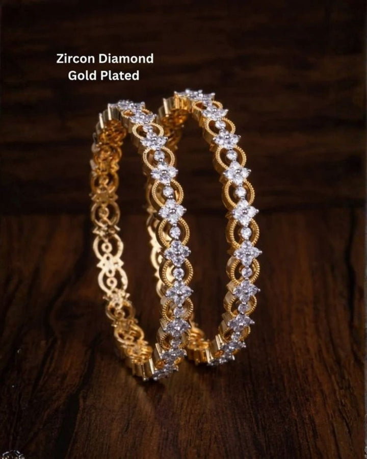 Gold-plated zircon diamond bangles comes with set of 2 and looks vert clear in picture how it looks and also in ide the bangle also in detailed and can be used for office ware , festivals and functions 