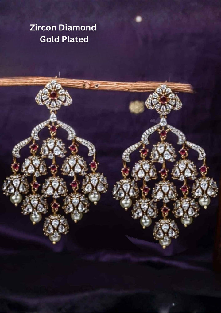 Zircon diamond gold plated red geam stones light weight earrings are waterproof, anti fade used for daily wear, office wear, weddings, and ideal for gifting. 
